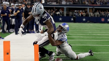 ARLINGTON, TEXAS - DECEMBER 30: CeeDee Lamb #88 of the Dallas Cowboys fumbles the ball for a touchback against Kindle Vildor #29 of the Detroit Lions during the second quarter in the game at AT&T Stadium on December 30, 2023 in Arlington, Texas.   Richard Rodriguez/Getty Images/AFP (Photo by Richard Rodriguez / GETTY IMAGES NORTH AMERICA / Getty Images via AFP)