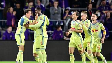 ORLANDO, FLORIDA - NOVEMBER 30: Andr?s Reyes #4 of the New York Red Bulls celebrates with teammates after scoring a goal against Orlando City during the second half at Exploria Stadium on November 30, 2024 in Orlando, Florida. Julio Aguilar/Getty Images/AFP (Photo by Julio Aguilar / GETTY IMAGES NORTH AMERICA / Getty Images via AFP)