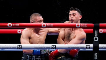 LOS ANGELES, CALIFORNIA - AUGUST 3: Isaac Cruz (L) throws a punch against Jose Valenzuela during the 11th round of the WBA Super Lightweight Title at BMO Stadium on August 3, 2024 in Los Angeles, California. Kevork Djansezian/Getty Images/AFP (Photo by KEVORK DJANSEZIAN / GETTY IMAGES NORTH AMERICA / Getty Images via AFP)