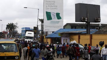 Lagos (Nigeria), 13/07/2020.- A billboard campaigning for the prevention of the coronavirus is seen standing in a neigbourhood in Lagos, Nigeria, 13 July 2020. While governments at various levels and other institutional agencies have invested several bill