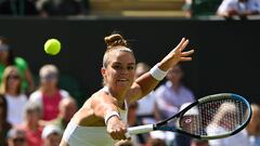 Greece's Maria Sakkari returns the ball to Germany's Tatjana Maria during their women's singles tennis match on the fifth day of the 2022 Wimbledon Championships at The All England Tennis Club in Wimbledon, southwest London, on July 1, 2022. (Photo by SEBASTIEN BOZON / AFP) / RESTRICTED TO EDITORIAL USE