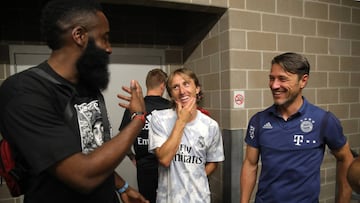 HOUSTON, TEXAS - JULY 20: James Harden talks to Luka Modric of Real and Niko Kovac, head coach of Bayern Muenchen after the International Champions Cup match between Bayern Muenchen and Real Madrid in the 2019 International Champions Cup at NRG Stadium on July 20, 2019 in Houston, Texas.  (Photo by Alexander Hassenstein/Bongarts/Getty Images)