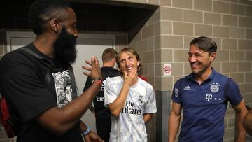HOUSTON, TEXAS - JULY 20: James Harden talks to Luka Modric of Real and Niko Kovac, head coach of Bayern Muenchen after the International Champions Cup match between Bayern Muenchen and Real Madrid in the 2019 International Champions Cup at NRG Stadium on July 20, 2019 in Houston, Texas. (Photo by Alexander Hassenstein/Bongarts/Getty Images)
