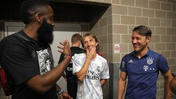 HOUSTON, TEXAS - JULY 20: James Harden talks to Luka Modric of Real and Niko Kovac, head coach of Bayern Muenchen after the International Champions Cup match between Bayern Muenchen and Real Madrid in the 2019 International Champions Cup at NRG Stadium on July 20, 2019 in Houston, Texas.  (Photo by Alexander Hassenstein/Bongarts/Getty Images)