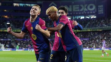 Barcelona's Spanish midfielder #16 Fermin Lopez (L) celebrates scoring his team's second goal during the Spanish league football match between Real Valladolid FC and FC Barcelona at the Jose Zorrilla stadium in Valladolid on May 3, 2025. (Photo by CESAR MANSO / AFP)