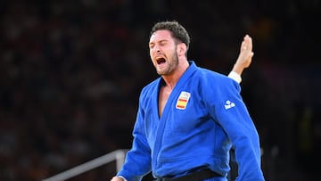 01 August 2024, France, Paris: Olympia, Paris 2024, judo, 100 kg, men, hope round, Champ de Mars Arena, Nikoloz Sherazadishvili from Spain cheers after the fight. Photo: Sina Schuldt/dpa (Photo by Sina Schuldt/picture alliance via Getty Images)