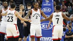 Nov 20, 2018; Orlando, FL, USA; Toronto Raptors forward Kawhi Leonard (2) is congratulated by guard Fred VanVleet (23) and guard Kyle Lowry (7) during the second half against the Orlando Magic at Amway Center. Mandatory Credit: Kim Klement-USA TODAY Sport