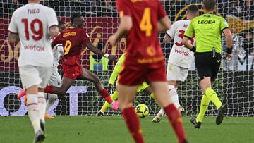 AS Roma's British forward Tammy Abraham shoots and scores a goal during the Italian Serie A football match between AS Rome and AC Milan at the Olympic stadium in Rome on April 29, 2023. (Photo by Alberto PIZZOLI / AFP)