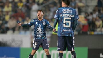 Pachuca's midfielder Erick Sanchez (L) gestures during the Concacaf Champions Cup semi-final second leg football match between Mexico's Pachuca and America at the Hidalgo stadium in Pachuca, Mexico, on April 30, 2024. (Photo by YURI CORTEZ / AFP)