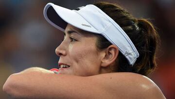 Garbine Muguruza of Spain reacts on a poinbt against Samantha Stosur of Australia in the women&#039;s round one at the Brisbane International tennis tournament in Brisbane on January 2, 2017. / AFP PHOTO / SAEED KHAN / --IMAGE RESTRICTED TO EDITORIAL USE - STRICTLY NO COMMERCIAL USE--