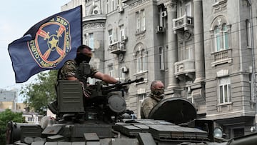 FILE PHOTO: Fighters of Wagner private mercenary group are seen atop a tank while being deployed near the headquarters of the Southern Military District in the city of Rostov-on-Don, Russia, June 24, 2023. REUTERS/Stringer/File Photo