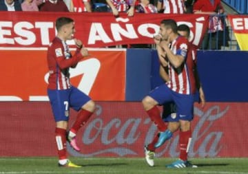 Celebración de Griezmann y Koke.