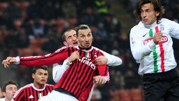 AC Milan&#039;s Swedish forward Zlatan Ibrahimovic (C) challanges for the ball with Juventus&#039; defender Giorgio Chiellini (back) and Juventus&#039; midfielder Andrea Pirlo during their Tim Cup semifinal football match between AC  Milan vs Juventus at 