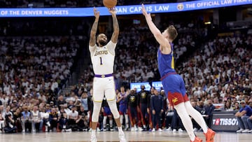 DENVER, COLORADO - APRIL 20: D'Angelo Russell #1 of the Los Angeles Lakers puts up a shot against Christian Braun #0 of the Denver Nuggets in the first quarter during game one of the Western Conference First Round Playoffs at Ball Arena on April 20, 2024 in Denver, Colorado. NOTE TO USER: User expressly acknowledges and agrees that, by downloading and or using this photograph, User is consenting to the terms and conditions of the Getty Images License Agreement.   Matthew Stockman/Getty Images/AFP (Photo by MATTHEW STOCKMAN / GETTY IMAGES NORTH AMERICA / Getty Images via AFP)