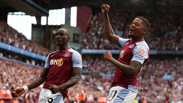 Aston Villa's Jamaican striker #31 Leon Bailey celebrates with Aston Villa's French midfielder #19 Moussa Diaby after scoring his team's third goal during the English Premier League football match between Aston Villa and Everton at Villa Park in Birmingham, central England on August 20, 2023. (Photo by Adrian DENNIS / AFP) / RESTRICTED TO EDITORIAL USE. No use with unauthorized audio, video, data, fixture lists, club/league logos or 'live' services. Online in-match use limited to 120 images. An additional 40 images may be used in extra time. No video emulation. Social media in-match use limited to 120 images. An additional 40 images may be used in extra time. No use in betting publications, games or single club/league/player publications. / 