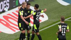 Dortmund&#039;s Norwegian forward Erling Braut Haaland (L) celebrates with teammates after scoring the second goal for his team during the German first division Bundesliga football match between Borussia Dortmund and SV Werder Bremen in Dortmund, western 