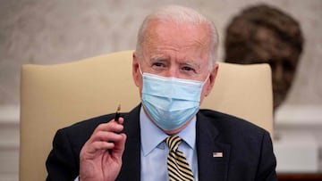 US President Joe Biden speaks during the weekly economic briefing in the Oval office of the White House in Washington, DC, on April 9, 2021. (Photo by JIM WATSON / AFP)