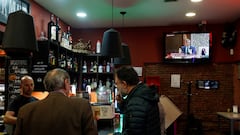 A TV screen shows Spanish Prime Minister Pedro Sanchez speaking before an inquiry committee, at a bar in Madrid, Spain, October 30, 2025. REUTERS/Susana Vera