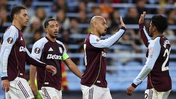Aston Villa's Dutch defender #17 Donyell Malen (2R) celebrates scoring his team's second goal during the UEFA Europa League league-stage football match between Aston Villa and Young Boys at Villa Park in Birmingham on November 27, 2025. (Photo by Darren Staples / AFP)