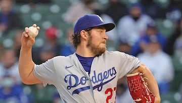 (FILES) In this file photo taken on May 4, 2021, starting pitcher Trevor Bauer, #27 of the Los Angeles Dodgers, delivers the ball against the Chicago Cubs at Wrigley Field in Chicago, Illinois. - The Los Angeles Dodgers said on January 6, 2023, they were parting ways with pitcher Trevor Bauer as his suspension over sexual assault allegations ended. Bauer's suspension had been slashed from 324 to 194 games by an independent arbitrator in December. (Photo by JONATHAN DANIEL / GETTY IMAGES NORTH AMERICA / AFP)