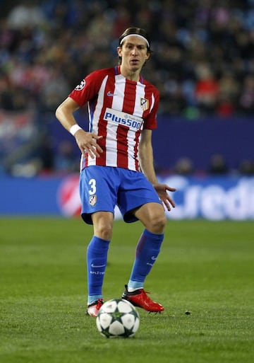 Filipe Luis returns to Atletico's starting line-up to play Espanyol