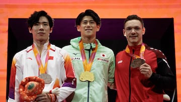 Zhang (plataI), Hashimoto (oro) y Seifert (brone), podio de la final del concurso completo.