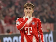 Bayern Munich's German midfielder #42 Lennart Karl scores his team's second goal 2:1 during the UEFA Champions League, league phase - day 6 football match between Bayern Munich and Sporting CP in Munich, southern Germany, on December 9, 2025. (Photo by Alexandra BEIER / AFP)