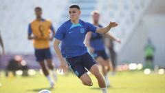 DOHA, QATAR - NOVEMBER 28: Phil Foden of England runs with the ball during a training session at Al Wakrah Stadium on November 28, 2022 in Doha, Qatar. (Photo by Eddie Keogh - The FA/The FA via Getty Images)