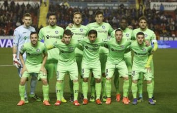 El once inicial del Getafe. De pie: Guaita, Juan Rodríguez, Cala, Vergini, Yoda y Pedro León. Agachados: Sarabia, Moi Gómez, Damián, Álvaro y Víctor Rodríguez. 