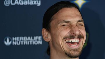 TOPSHOT - LA Galaxy footballer Zlatan Ibrahimovic laughs during his first press conference for the club in Los Angeles, California, on March 30, 2018.
 The 36-year-old Swedish striker&#039;s move to MLS from Manchester United was confirmed last week, with