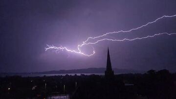 Lightning strikes during a thunderstorm after a heatwave, in Dundee, Scotland, Britain August 15, 2022 in this screen grab obtained from a video. Kev Reilly via REUTERS  THIS IMAGE HAS BEEN SUPPLIED BY A THIRD PARTY. MANDATORY CREDIT. NO RESALES. NO ARCHIVES.