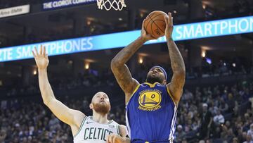 March 5, 2019; Oakland, CA, USA; Golden State Warriors center DeMarcus Cousins (0) shoots the basketball against Boston Celtics center Aron Baynes (46) during the second quarter at Oracle Arena. Mandatory Credit: Kyle Terada-USA TODAY Sports