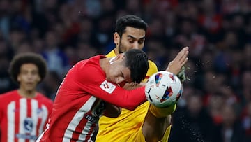 MADRID, 17/03/2024.- Ilkay Gündogan (d) del FC Barcelona y Álvaro Morata, del Atlético de Madrid, durante el partido de Liga en Primera División que Atlético de Madrid y FC Barcelona disputan este domingo en el estadio Metropolitano. EFE/JuanJo Martín