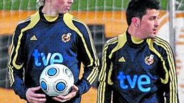 <b>EL GOL. </b>Torres y Villa, ayer en el entrenamiento en Las Rozas.