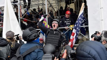 Joe Biden has blasted the "insurrection" of Donald Trump supporters who stormed the US Congress in a riot that saw a woman shot dead and many arrested.