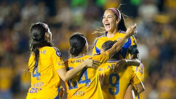 Tigres Femenil's Cristina Ferral (R) celebrates with teammates after scoring during the CONCACAF W Champions Cup football tournament match at the Universitario Stadium in Monterrey, Mexico, on August 22, 2024. (Photo by Julio Cesar AGUILAR / AFP)
