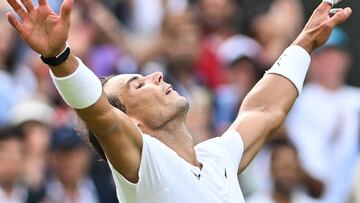 Spain's Rafael Nadal celebrates winning against US player Taylor Fritz after winning his men's singles quarter final tennis match on the tenth day of the 2022 Wimbledon Championships at The All England Tennis Club in Wimbledon, southwest London, on July 6, 2022. (Photo by Glyn KIRK / AFP) / RESTRICTED TO EDITORIAL USE