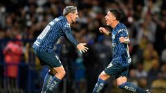 America's Alejandro Zendejas (R) celebrates with teamamte Diego Valdes after scoring againsts Pumas during their Mexican Apertura football tournament match between Pumas and America at the Olimpico stadium in Mexico City, on August 13, 2022. (Photo by RODRIGO ARANGUA / AFP)