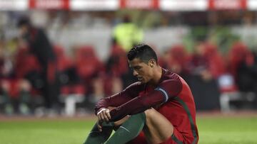 Portugal's forward Cristiano Ronaldo reacts after failing to score a penalty kick during the EURO 2016 friendly football match Portugal vs Bulgaria at Magalhaes Pessoa stadium in Leiria on March 25, 2016.
