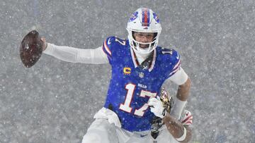 Dec 1, 2024; Orchard Park, New York, USA; Buffalo Bills quarterback Josh Allen (17) breaks a tackle by San Francisco 49ers linebacker Fred Warner (54) to score a touchdown in the fourth quarter at Highmark Stadium. Mandatory Credit: Mark Konezny-Imagn Images