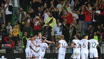 Manchester United's Portuguese striker Cristiano Ronaldo celebrates with teammates after scoring the 0-2 from the penalty spot during the UEFA Europa League group E football match between Sheriff and Manchester United at Zimbru stadium in Chisinau on September 15, 2022. (Photo by Daniel MIHAILESCU / AFP) (Photo by DANIEL MIHAILESCU/AFP via Getty Images)