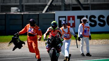 Apr 12, 2024; Austin, TX, USA; Joan Mir (36) of Spain and Repsol Honda Team is assisted with starting his motorcycle after he crashes during practice for the MotoGP Grand Prix of the Americas at Circuit of The Americas. Mandatory Credit: Jerome Miron-USA TODAY Sports