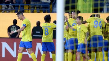 Nassr's Portuguese forward #07 Cristiano Ronaldo and teammates celebrate after he scored a goal during the AFC Champions League Group E football match between Saudi's al-Nassr and Qatar�s al-Duhail at the King Saud University Stadium in Riyadh on October 24, 2023. (Photo by Fayez NURELDINE / AFP)