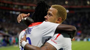 Soccer Football - Ligue 1 - Olympique Lyonnais v RC Strasbourg - Groupama Stadium, Lyon, France - August 24, 2018 Lyon's Bertrand Traore celebrates scoring their second goal with Memphis Depay REUTERS/Emmanuel Foudrot