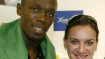 <b>DOS ESTRELLAS. </b>Usain Bolt y Yelena Isinbayeva, ayer en Zúrich.