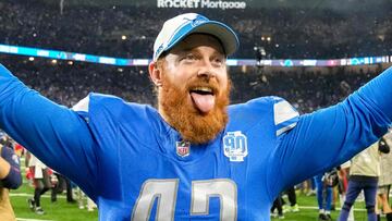 NFL long snapper McQuaide was removed from Mass at a Catholic Church after publicly demanding answers from the chancellor of the Cincinnati Archdiocese.