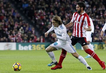 Modric y Raúl García.