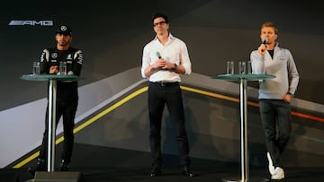 STUTTGART, GERMANY - MARCH 11:  Lewis Hamilton of Great Britain and Mercedes GP (L) faces the media with Toto Wolff, Head of Mercedes Benz Motorsport (c) and Nico Rosberg of Germany and Mercedes GP during the Mercedes Benz Motorsport Kickoff 2016 at the Inner Sanctum on March 11, 2016 in Stuttgart, Germany.  (Photo by Alexander Hassenstein/Bongarts/Getty Images)