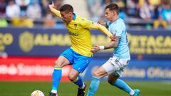 CADIZ, SPAIN - FEBRUARY 12: Ruben Alcaraz of Cadiz CF competes for the ball with Santi Mina of Celta de Vigo during the LaLiga Santander match between Cadiz CF and RC Celta de Vigo at Estadio Nuevo Mirandilla on February 12, 2022 in Cadiz, Spain. (Photo b