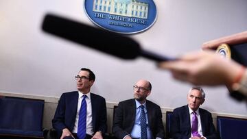 US Secretary of the Treasury Steven Mnuchin, Director of the Office of Management and Budget Russell Vought and coronavirus task force member Scott Atlas attend Donald Trump's briefing at the White House August 10, 2020, in Washington, DC